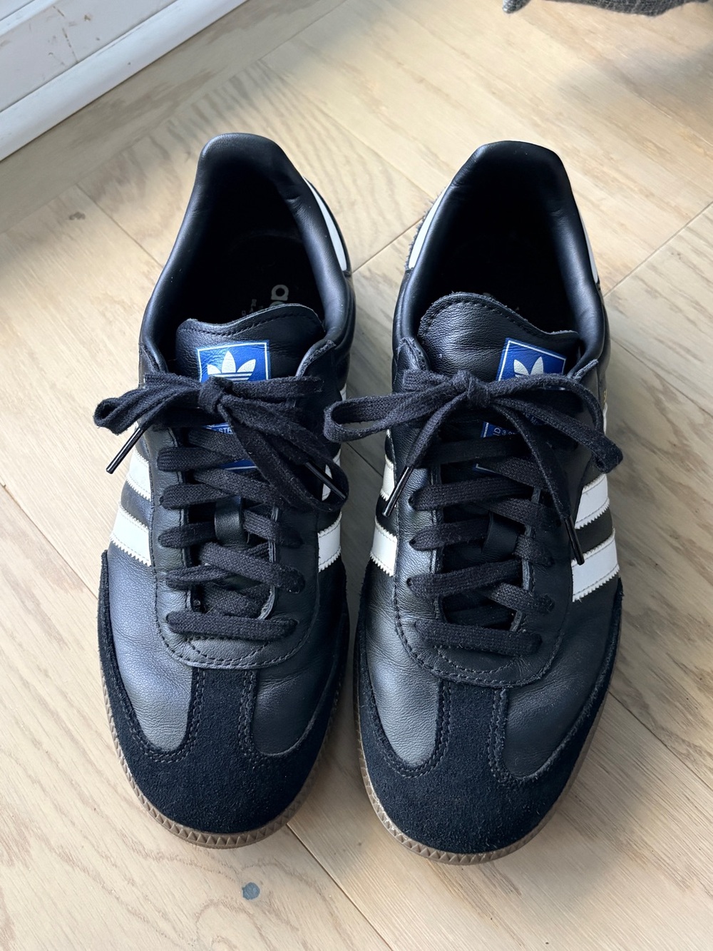 adidas Women’s Black Sambas with White Stripes and Blue Logo